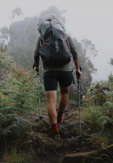 Person wearing a Rab down jacket outdoors